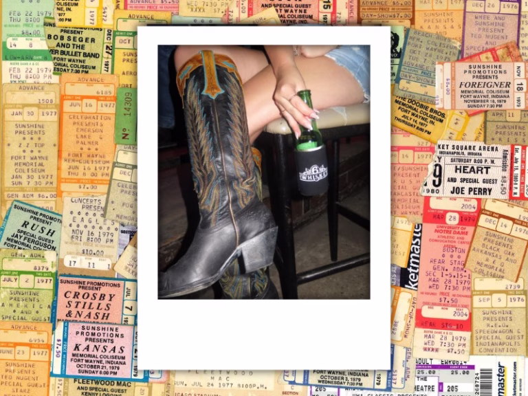 Woman wearing cowboy boots holding a beer